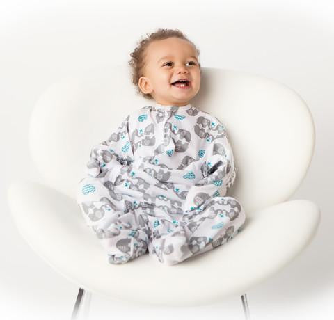 A Baby with Zipadee-Zip, the swaddle transition blanket