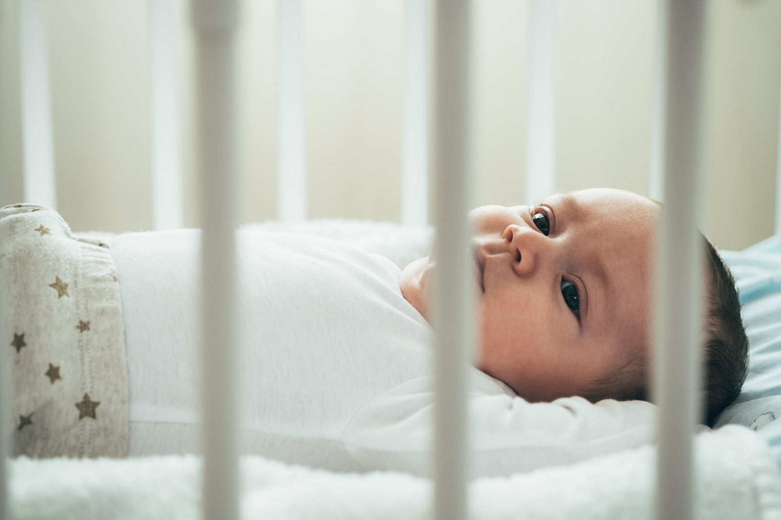 Baby in Crib – How to Get Baby to Sleep in Crib Hero Image
