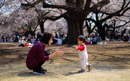 From baby rolling over to walking, young baby learns new milestones 