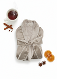 Load image into Gallery viewer, Beige robe with a cup of tea, cinnamon sticks, and orange slices on a white background
